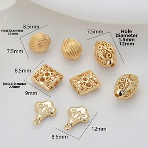 Macro shot of 14k gold-filled beads showing hollow textures and precise size measurements