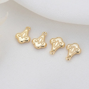 Set of four 14k gold-filled vintage relief beads with intricate floral patterns for DIY bracelets