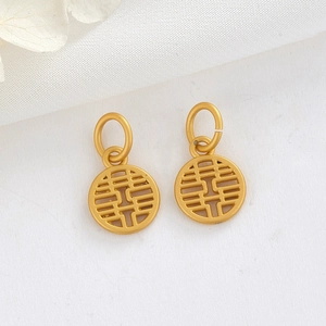 Pendentif rond doré ajouré avec le caractère Double Bonheur pour création de bijoux