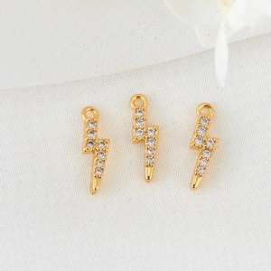 Three 14K gold plated lightning bolt pendants with sparkling white cubic zirconia