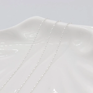 Minimalist 14K gold-plated tassel chain necklace with beaded rectangular link design