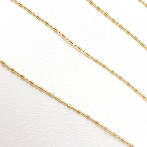 Luxurious 14K gold bead chain necklace with polished oval links in a minimalist style