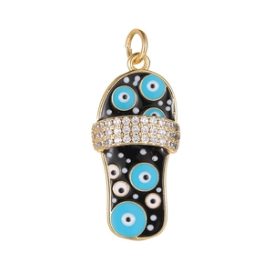 14K gold slipper pendant with black enamel evil eye patterns and sparkling zircons