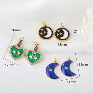 Detail of enamel fruit and celestial pendants with precise dimensions and gold finish