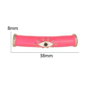 Detailed view of pink enamel evil eye tube bead for DIY jewelry making with dimensions