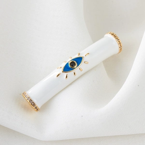 Bohemian copper evil eye cylinder bead with white enamel and sparkling crystal details