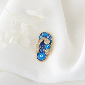 Creative gold evil eye flip-flop pendant with blue enamel and sparkling zircon accents