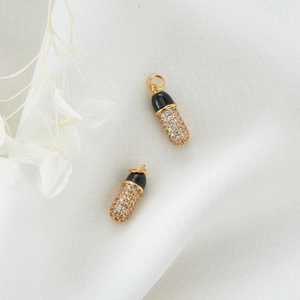 Creative 14K gold-plated capsule pendant with black enamel and micro-paved zircons