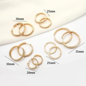Golden round hoop earrings with zircon pavé in various sizes from 20mm to 35mm