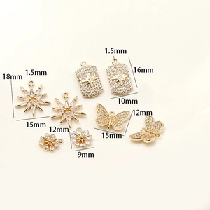 14k gold-plated brass butterfly and star charms with sparkling cubic zirconia stones