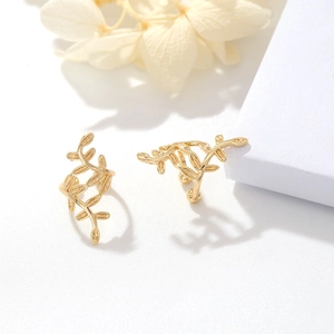 Elegant 14k gold plated leaf ear cuffs for non-pierced ears on minimalist white background
