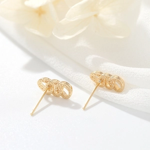 Elegantes pendientes de plata 925 con triple aro entrelazado dorado y micro circonitas