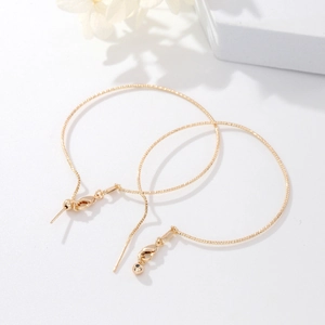 14K gold plated textured hoop earrings with sparkling cut finish and lobster clasp