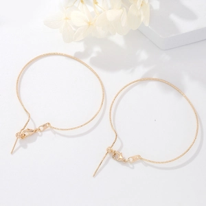 Detail of 14K gold-plated box chain bracelets with adjustable needle and lobster clasp