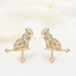Golden cat-shaped stud earrings with sparkling white cubic zirconia collar details