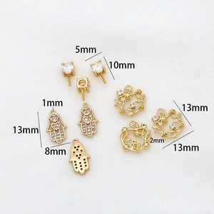 Detailed view of 14K gold plated copper jewelry charms with zircon measurements