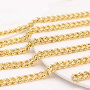 Detailed view of a 7mm high-polish 14K gold-plated Cuban link chain for DIY crafts