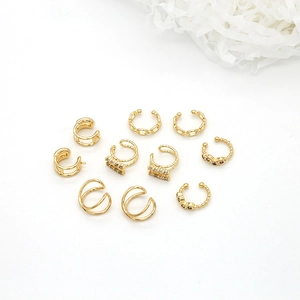 Set de 9 bagues d'oreille dorées en zircon pour femmes avec designs minimalistes sans perçage