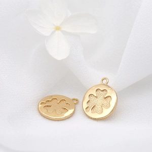Polished 14k gold plated round clover pendant with textured embossing for DIY jewelry