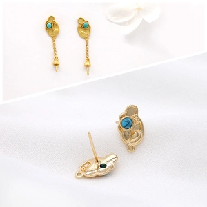 Handmade S925 silver bird earrings with blue turquoise stones and golden chain pendants