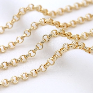 Gold-plated rolo chain with textured checkered cylindrical links for DIY jewelry making