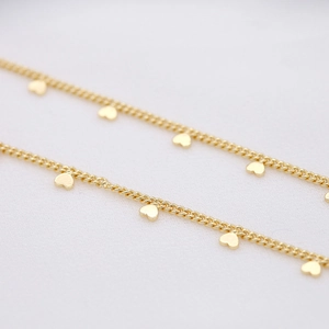 Polished 1.6mm copper chain featuring small solid heart charms for DIY jewelry making
