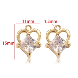 Detailed view of 14k gold heart-shaped charm with measurements 11mm width and 15mm height