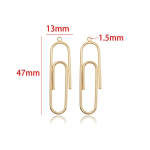 Detail view of 18k gold plated paperclip charms with precise 47mm and 13mm dimensions
