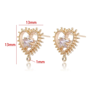 Détail du composant de boucle d'oreille cœur plaqué or 14k avec zircon et mesure 13mm