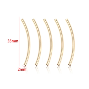Detailed view of five 35mm golden curved tube beads with 2mm diameter for jewelry making
