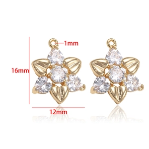 Detailed size specifications for snowflake gold pendants with green cubic zirconia inlay