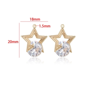 Macro view of star-shaped golden pendants with 18mm x 20mm dimensions and zircon inlay