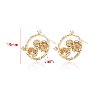 Detail of 14k gold plated 15mm hoop earrings with cubic zirconia and petal accents