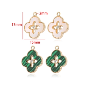 Detailed view of 15mm clover pendant dimensions with white shell and green stone inlay