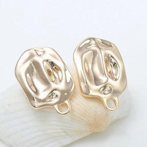 Boucles d'oreilles ovales dorées à texture martelée avec base en argent 925 pur