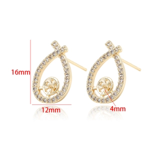 Detail view of water drop cross stud earring with white zircon inlay and 4mm pearl tray
