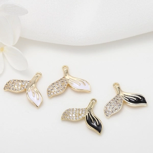 14K gold-plated dolphin tail pendants with micro-pave crystals and black white enamel