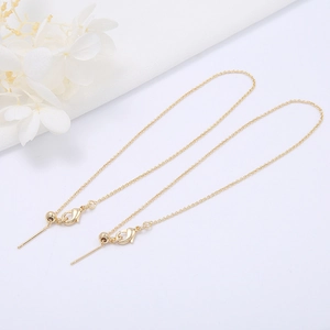 Detailed view of 14k gold-filled adjustable O-chain with lobster clasp and sliding bead