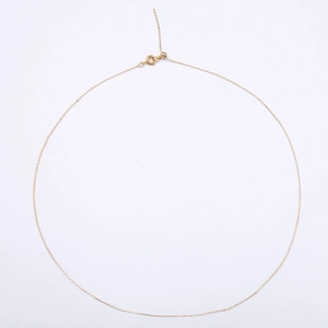 Adjustable 14k gold filled chain necklace with sliding positioning bead on white background