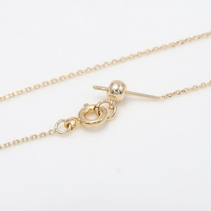 Detail of 14k gold-filled adjustable slider ball and spring ring clasp on chain