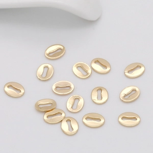 Maillons bijoux grain de café dorés polis sur blanc pour création de colliers DIY