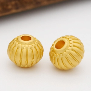Perles dorées mates avec relief vertical et accents de points pour bijoux DIY