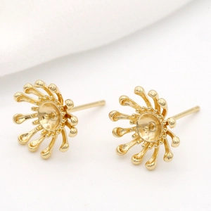Macro view of 14k gold plated flower shaped OT toggle clasps for jewelry making