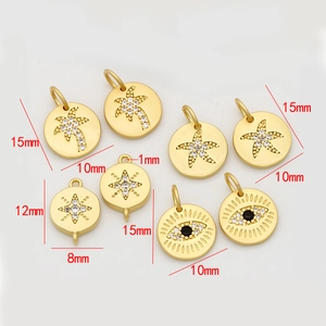 Gold-plated palm tree, starfish and evil eye charms with micro-paved cubic zirconia