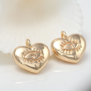 Lot de deux pendentifs cœur plaqués or 14k avec design œil protecteur et zircon