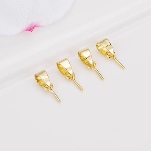 Detailed view of 14K gold plated 3-shaped jewelry clasp connectors for DIY necklaces