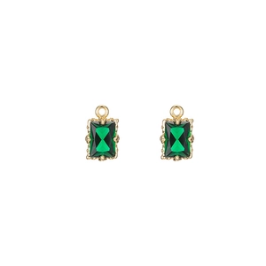 Pair of emerald green rectangle zircon pendants with gold-plated beaded edge bezels