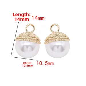 Detail of 14k gold pearl pendants measuring 14mm by 10.5mm for DIY jewelry making