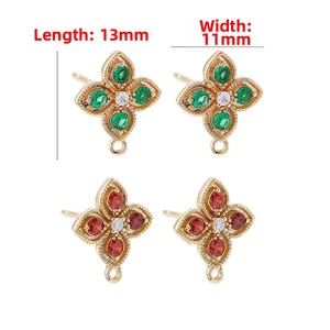 Detail of 14k gold plated clover earring charms with 13mm by 11mm dimensions
