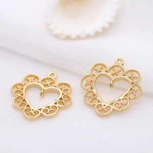 14k gold plated heart lace pendants for DIY jewelry making on white fabric